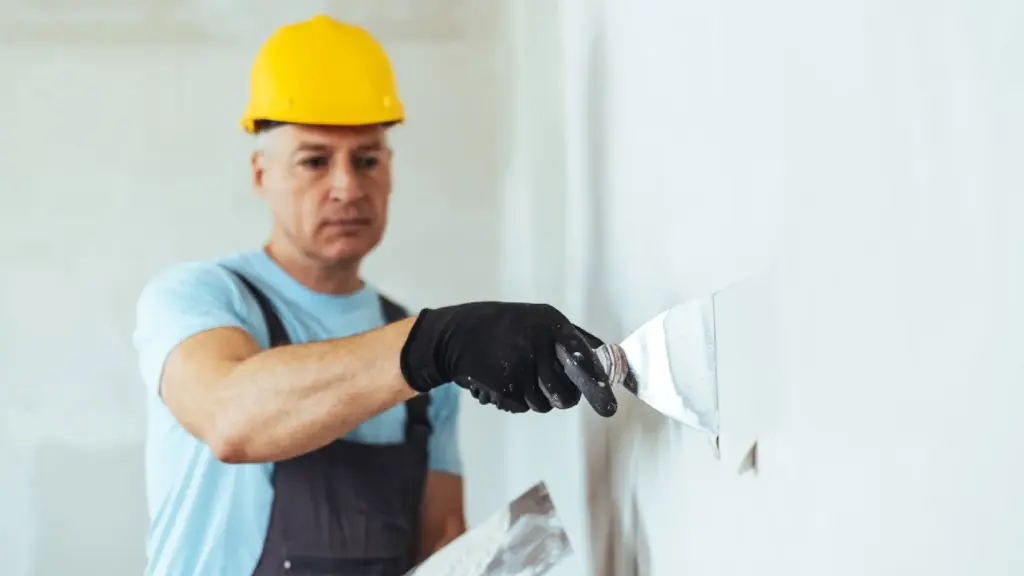man finishing drywall 1407100026